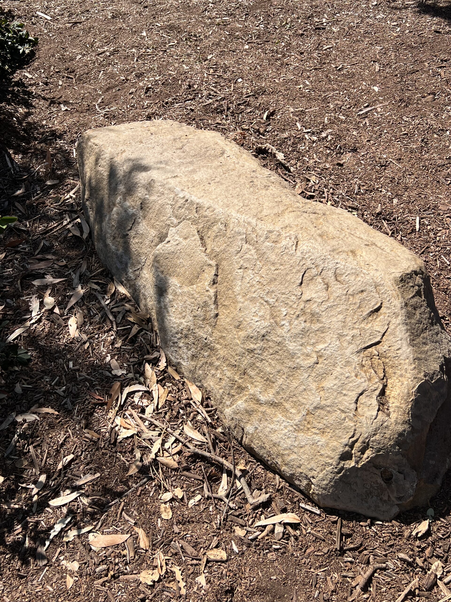 Real rock on location that was covered in graffiti.